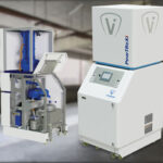 Volkmann PowTReX metal powder transfer recovery system shown as installed and with interior revealed