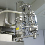 Volkmann pneumatic vacuum conveyor installed in process